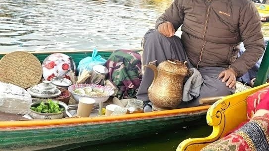 Best Places To Have Kashmiri Kahwa Tea in Srinagar Authentic Kashmiri samovar tea preparation What to eat with Kashmiri kahwa Shikara kahwa on Dal Lake cost Where to buy Pampore saffron for kahwa Street food and tea tour in Srinagar Sugar-free kahwa options in Srinagar Luxury hotels in Srinagar with kahwa service Sunset kahwa experience at Dal Lake Kashmiri kahwa ingredients and spices 3-day Srinagar itinerary for food lovers 2026 Kashmiri Kahwa Price